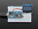 Monochrome 1.3\" 128x64 OLED graphic display - STEMMA QT / Qwiic